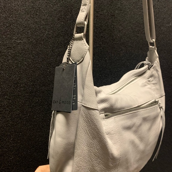 Day & Mood
Leather Studded Fringe Hobo Bag - Picture 13 of 14